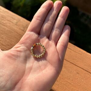 Ring golden color and orange/black/white beads Halloween style